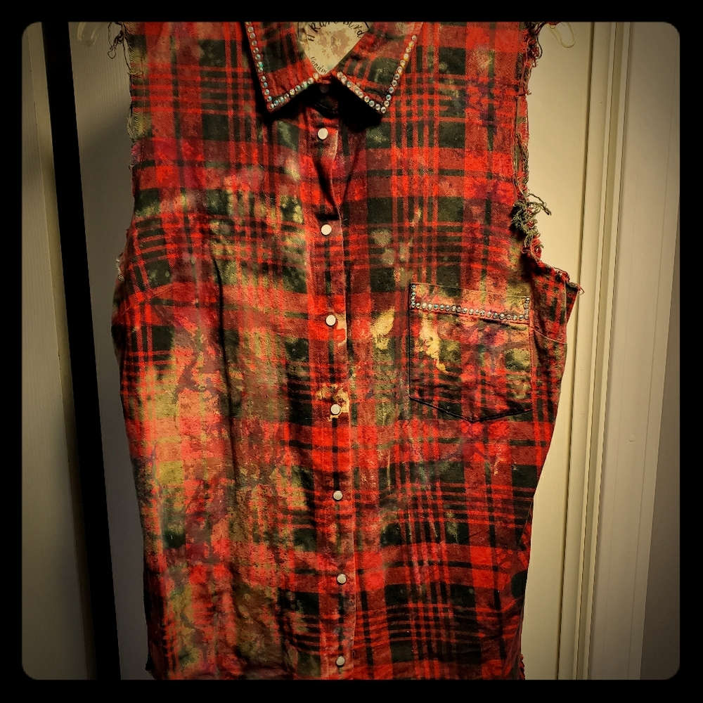 Distressed sleeveless button down
